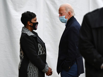 US President-elect Joe Biden speaks with Atlanta mayor Keisha Lance Bottoms after speaking in support of Democratic Senate candidates Jon Ossoff and Reverend Raphael Warnock during a campagin rally in Atlanta, Georgia on December 15, 2020. (Photo by JIM WATSON / AFP) (Photo by JIM WATSON/AFP via Getty Images)