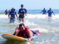 VIDEO – Blind Veteran Surfs with Fellow Service Members: ‘A Beautiful Experience’