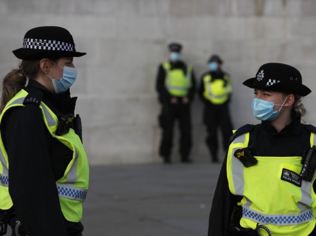Police patrol in Trafalgar Square ahead of a possible anti-lockdown protest in central Lon