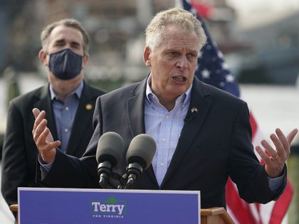 Former Virginia Gov. Terry McAuliffe, right, gestures during a news conference with Virginia Gov. Ralph Northam, left, at Waterside in Norfolk, Va., Thursday, April 8, 2021. Northam endorsed McAuliffe for Governor. (AP Photo/Steve Helber)