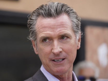 FILE - In this June 3, 2021, file photo California Gov. Gavin Newsom listens to questions during a news conference in San Francisco. Democrats in the state Legislature are trying to alter the state's recall laws in a move that would allow Newsom's election to be held earlier. They are …