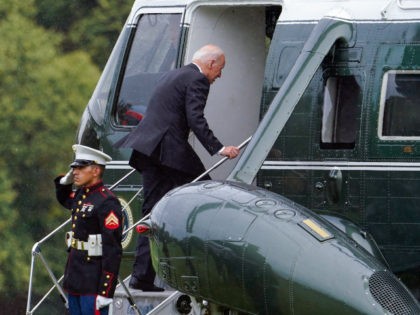 President Joe Biden boards Marine One as he leaves Fort Lesley J. McNair in Washington, Mo