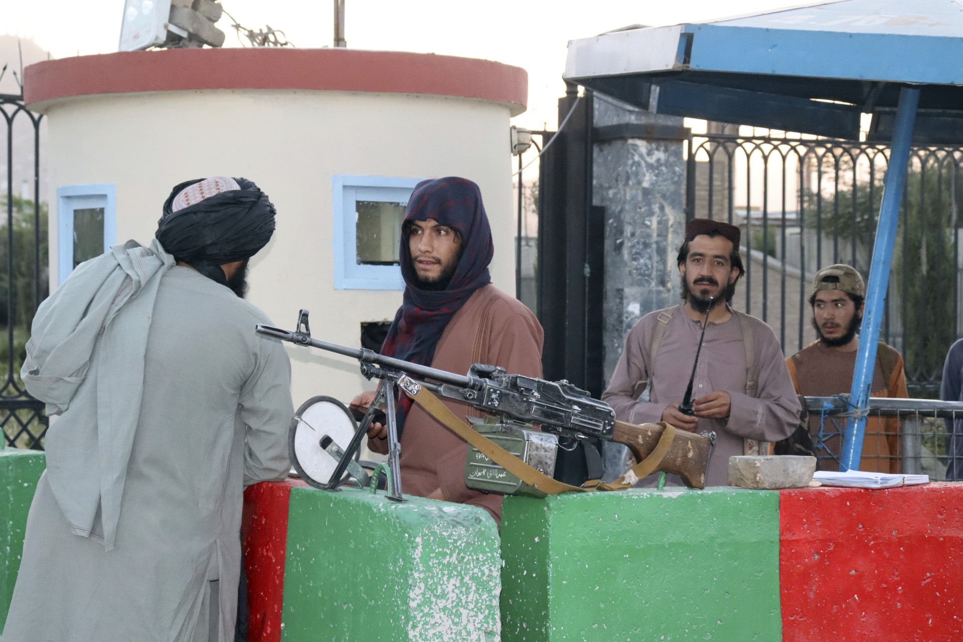 Taliban fighters stand guard at a checkpoint in Kabul, Afghanistan, Wednesday, Aug. 25, 2021. The Taliban wrested back control of Afghanistan nearly 20 years after they were ousted in a U.S.-led invasion following the 9/11 attacks. Their return to power has pushed many Afghans to flee, fearing reprisals from the fighters or a return to the brutal rule they imposed when they last ran the country. (AP Photo/Khwaja Tawfiq Sediqi)