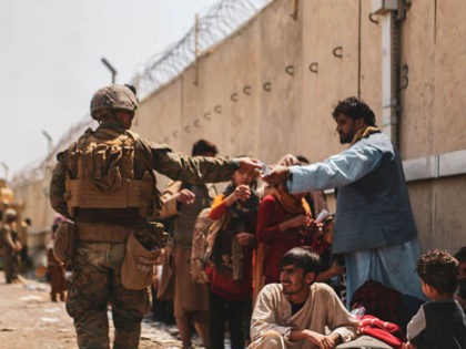 HAMID KARZAI INTERNATIONAL AIRPORT, AFGHANISTAN - AUGUST 22: This handout image shows A Ma