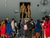 Report: Evacuated Afghan Detained at Qatar Base Has Possible ISIS Links