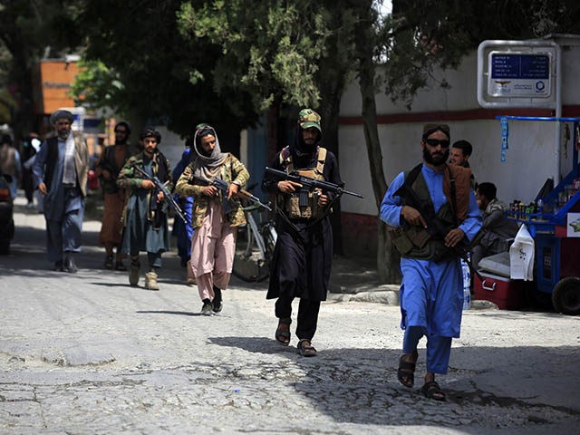 Taliban fighters patrol in the Wazir Akbar Khan neighborhood in the city of Kabul, Afghani