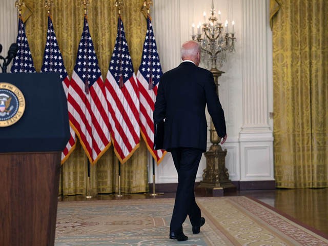 WASHINGTON, DC - AUGUST 16: U.S. President Joe Biden walks away without taking questions after delivering remarks on the worsening crisis in Afghanistan from the East Room of the White House August 16, 2021 in Washington, DC. Biden cut his vacation in Camp David short to address the nation as …