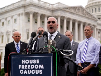 Rep. Clay Higgins, R-La., and other members of the conservative House Freedom Caucus call for the removal of President Joe Biden over the close of war in Afghanistan, at the Capitol in Washington, Tuesday, Aug. 31, 2021. (AP Photo/J. Scott Applewhite)