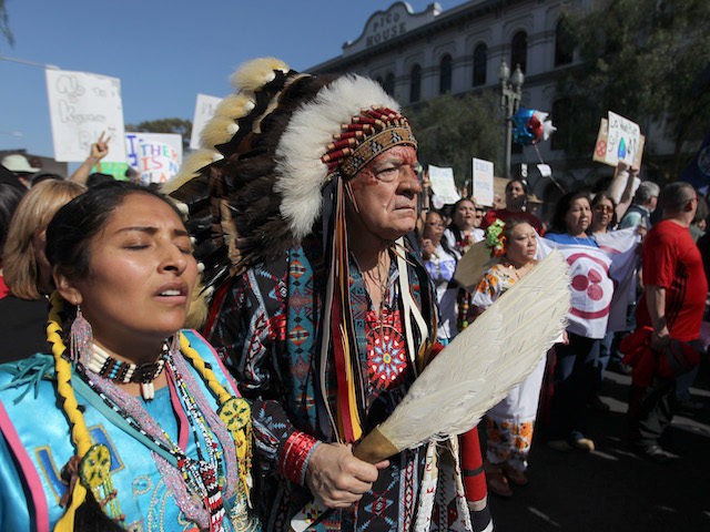 LOS ANGELES, CA - FEBRUARY 17: Chief Phil Lane of the Yankton Dakota and Chickasaw First Nations marches with demonstrators to City Hall during the "Forward on Climate" rally to call on President Obama to take strong action on the climate crisis on February 17, 2013 in Los Angeles, California. …