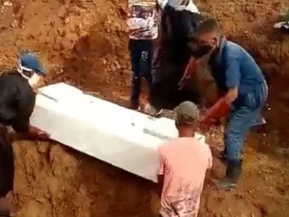 Cubans bury the dead in neighborhoods.