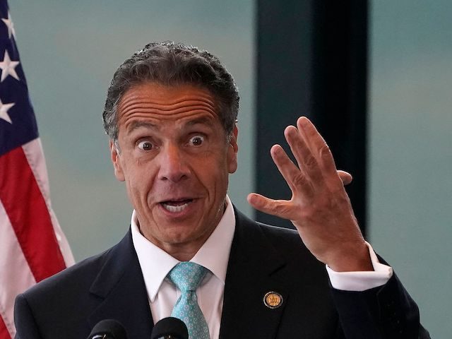 New York Governor Andrew Cuomo speaks during an event to announce that New York will lift 'virtually all' Covid-19 restrictions, after the state cleared the threshold of 70 percent vaccinated, at One World Trade Center in New York on June 15, 2021 (Photo by TIMOTHY A. CLARY / AFP) (Photo …