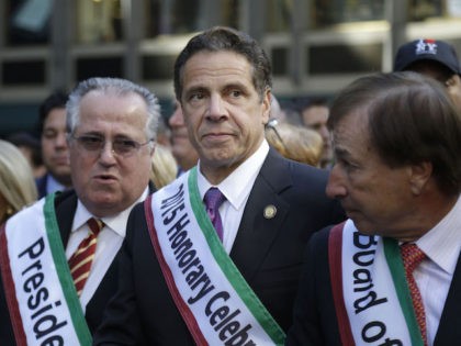New York Governor Andrew Cuomo prepares to march in the Columbus Day Parade in New York, Monday, Oct. 12, 2015. Approximately 35,000 marchers participated in the annual celebration of Italian-American culture. (AP Photo/Seth Wenig)