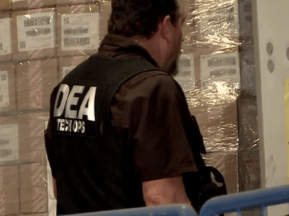 DEA agents raided a warehouse in southwest Houston and seized 27 tractor-trailer loads of opiate narcotics. (Video Screenshot: Fox 26 Houston/Ed Lightbourn)
