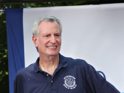 NEW YORK, NEW YORK - JULY 07: Mayor of New York City, Bill de Blasio (R) and First Lady of