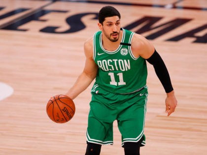 LAKE BUENA VISTA, FLORIDA - AUGUST 02: Enes Kanter #11 of the Boston Celtics handles the b