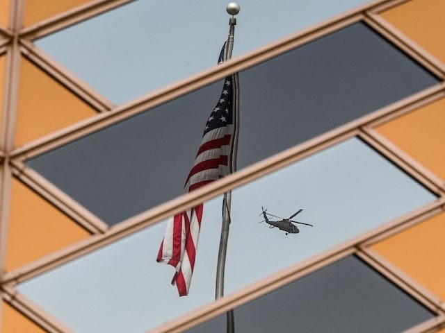 US national flag is reflected on the windows of the US embassy building in Kabul on July 30, 2021. (Photo by SAJJAD HUSSAIN / AFP) (Photo by SAJJAD HUSSAIN/AFP via Getty Images)