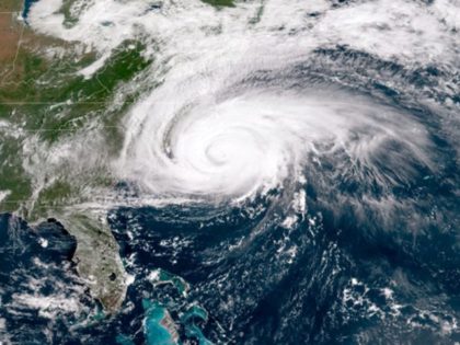 IN SPACE - SEPTEMBER 13: In this NOAA satellite handout image captured at 15:02 UTC, shows Hurricane Florence as it travels west in the Atlantic Ocean off the coast of the U.S. on September 13, 2018. Coastal cities in North Carolina, South Carolina and Virginia are under evacuation orders as …