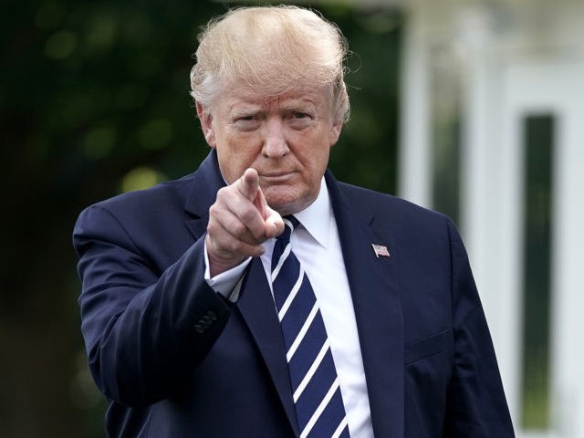 WASHINGTON, DC - JULY 19: U.S. President Donald Trump walks out of the White House before