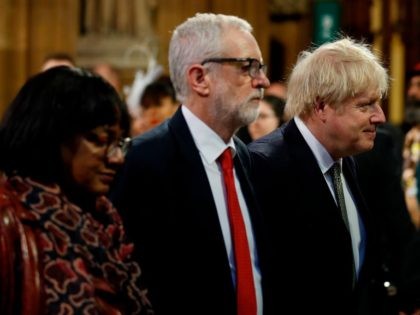 Britain's Prime Minister Boris Johnson (R), Britain's Labour Party leader Jeremy Corbyn (C) and Britain's Labour Party Shadow Home Secretary Dianne Abbott (L) process through the Central Lobby during the State Opening of Parliament at the Houses of Parliament in London on December 19, 2019. - The State Opening of …