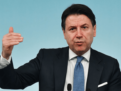 In this photo taken on March 04, 2020 Italy's Prime Minister Giuseppe Conte speaks during a press conference held at Rome's Chigi Palace, following a Ministers' cabinet meeting dedicated to the corinavirus crisis. - Lockdown measures taken in Italy over the coronavirus pandemic will be extended beyond their original deadlines, …