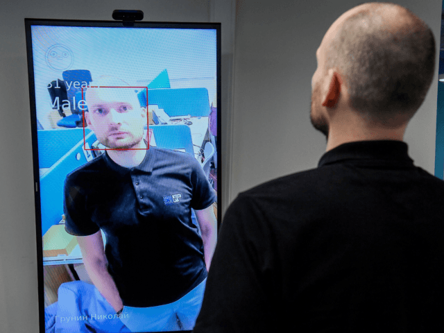 Nikolai Grunin, an employee at NtechLab, the company that won the city's tender to supply the facial recognition technology, demonstrates the technology during an interview with AFP on February 5, 2020. - A vast and contentious network of facial-recognition cameras keeping watch over Moscow is now playing a key role …