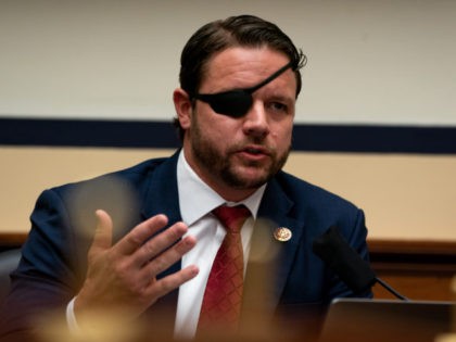 WASHINGTON, DC - JULY 22: Rep. Dan Crenshaw (R-TX) speaks as Peter T. Gaynor, Administrator of the Federal Emergency Management Agency (FEMA) testifies during a hearing before the House Committee on Homeland Security on Capitol Hill July 22, 2020 in Washington DC. (Photo by Anna Moneymaker-Pool/Getty Images)