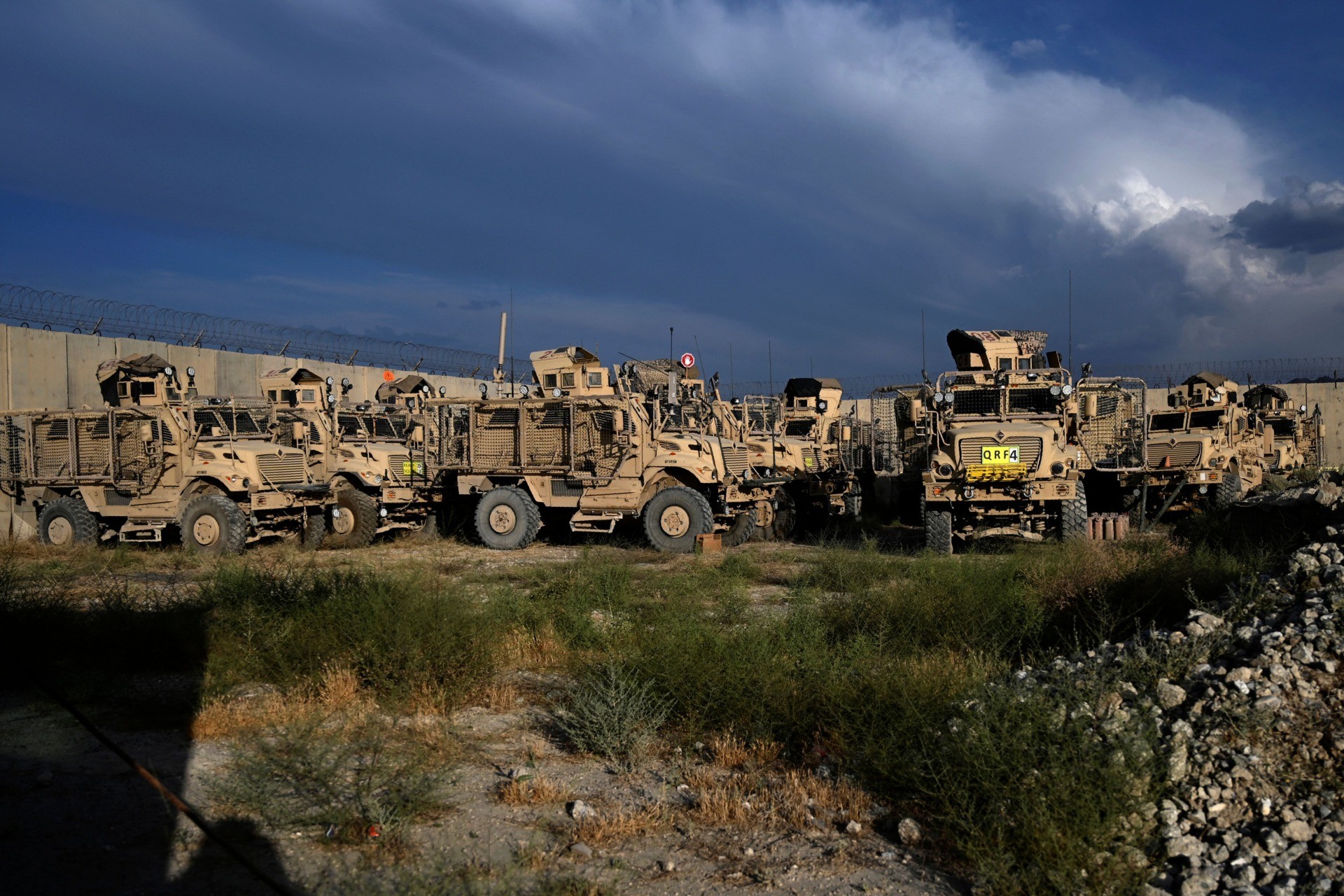 TOPSHOT - Mine resistant ambush protection vehicles (MRAP) are seen inside the Bagram US air base after all US and NATO troops left,some 70 Km north of Kabul on July 5, 2021. (Photo by WAKIL KOHSAR / AFP) (Photo by WAKIL KOHSAR/AFP via Getty Images)