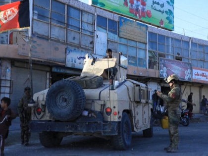 This video screen grab from AFPTV shows Afghan special forces patrol the streets of Herat