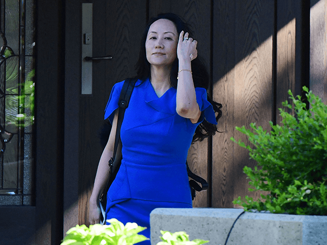 Huawei CFO Meng Wanzhou leaves her Vancouver home to attend her extradition hearing in British Columbia Supreme Court, on August 4, 2021, in Vancouver, Canada. - Meng is back in a Canadian court on for a final round of hearings on her possible extradition to the US, after nearly three …