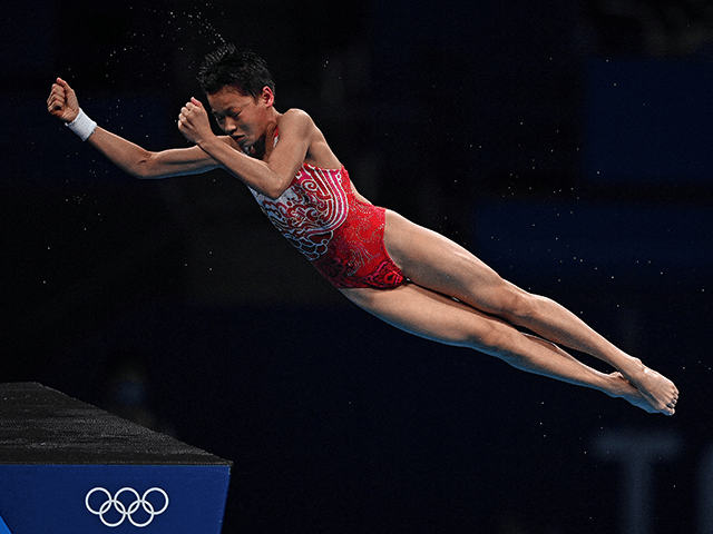 China's Quan Hongchan competes to win the women's 10m platform diving final event during t