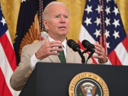 US President Joe Biden speaks about the July jobs reports in the East Room of the White House in Washington, DC, on August 6, 2021. - The US economy added 943,000 new jobs in July, according to government data released on August 6, as hard-hit industries continued to return to …