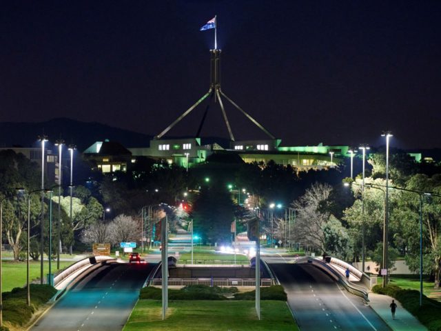 A general view shows a near-empty road around Parliament House (back, C) in Canberra on August 12, 2021, as Australia's capital was ordered into a seven-day lockdown after a single Covid-19 case was detected. (Photo by Rohan THOMSON / AFP) (Photo by ROHAN THOMSON/AFP via Getty Images)