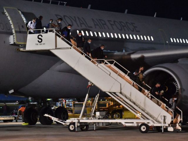 Passengers repatriated from Afghanistan, disembark from an RAF Airbus KC2 Voyager aircraft