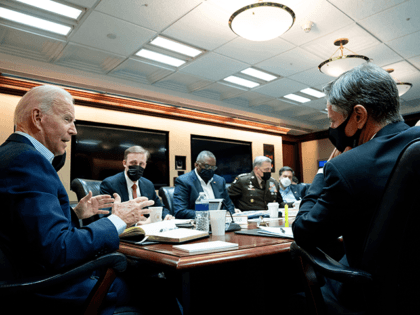 In this handout photo provided by the White House, President Joe Biden meets with his national security team for an operational update on the situation in Afghanistan on August 22, 2021 at the White House in Washington, DC. They discussed the security situation in Afghanistan and counterterrorism operations, including ISIS-K. …
