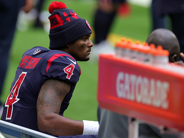 Quarterback Deshaun Watson #4 of the Houston Texans looks on from the bench late in the fo