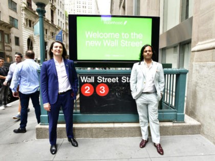 NEW YORK, NEW YORK - JULY 29: : Baiju Bhatt and Vlad Tenev outside the Wall Street subway station during Robinhood Markets IPO Listing Day on July 29, 2021 in New York City. (Photo by Eugene Gologursky/Getty Images for Robinhood)