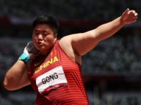 TOKYO, JAPAN - AUGUST 01: Lijiao Gong of Team China competes in the Women's Shot Put Final on day nine of the Tokyo 2020 Olympic Games at Olympic Stadium on August 01, 2021 in Tokyo, Japan. (Photo by Cameron Spencer/Getty Images)