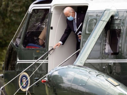 President Joe Biden steps off Marine One as he returns to the White House on August 02, 20