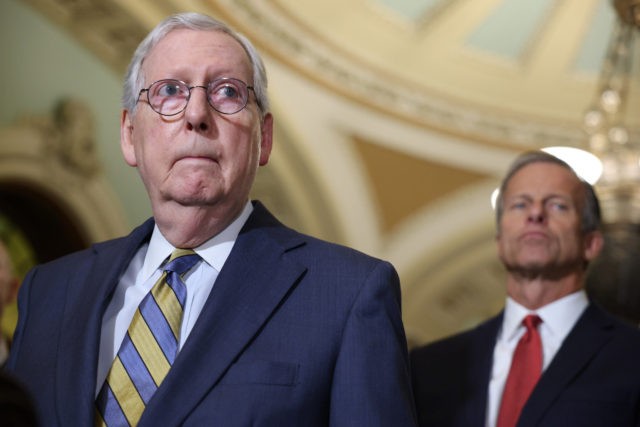 WASHINGTON, DC - AUGUST 03: Senate Minority Leader Mitch McConnell (R-KY) listens to a question during a news conference following a policy luncheon at the Capitol Building on August 3, 2021 in Washington, DC. Leader McConnell expressed his wish that Senate Majority Leader Chuck Schumer (D-NY) not file cloture to …