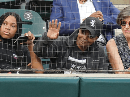 Mayor of Chicago Lori Lightfoot waves while attending a game between the Chicago White Sox