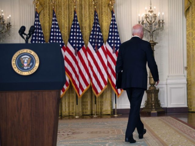 WASHINGTON, DC - AUGUST 16: U.S. President Joe Biden walks away without taking questions after delivering remarks on the worsening crisis in Afghanistan from the East Room of the White House August 16, 2021 in Washington, DC. Biden cut his vacation in Camp David short to address the nation as …