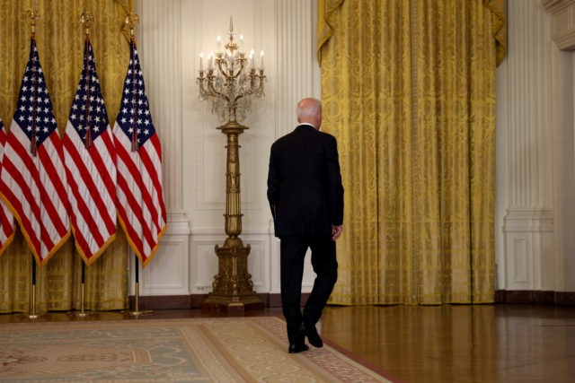 WASHINGTON, DC - AUGUST 16: U.S. President Joe Biden walks away without taking questions after delivering remarks on the worsening crisis in Afghanistan from the East Room of the White House August 16, 2021 in Washington, DC. Biden cut his vacation in Camp David short to address the nation as …
