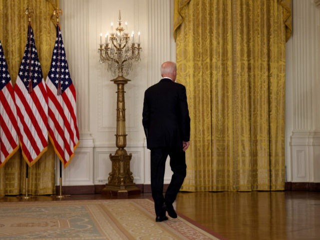 WASHINGTON, DC - AUGUST 16: U.S. President Joe Biden walks away without taking questions after delivering remarks on the worsening crisis in Afghanistan from the East Room of the White House August 16, 2021 in Washington, DC. Biden cut his vacation in Camp David short to address the nation as the Taliban have seized control in Afghanistan two weeks before the U.S. is set to complete its troop withdrawal after a costly two-decade war. (Photo by Anna Moneymaker/Getty Images)