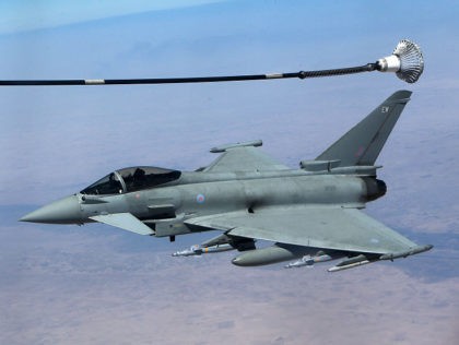 This photo taken on September 21, 2016 shows a Britain's Royal Air Force Eurofighter Typhoon fighter jet refueling from a tanker aircraft during a coalition mission over central Iraq. British Tornado and Typhoon aircraft stationed at a UK air base in Cyprus are pounding Islamic State targets ahead of a …