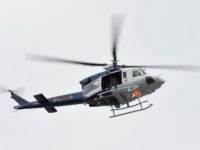 WATCH: Police Helicopter Orders Beachgoers Home, Hovers over Backyards