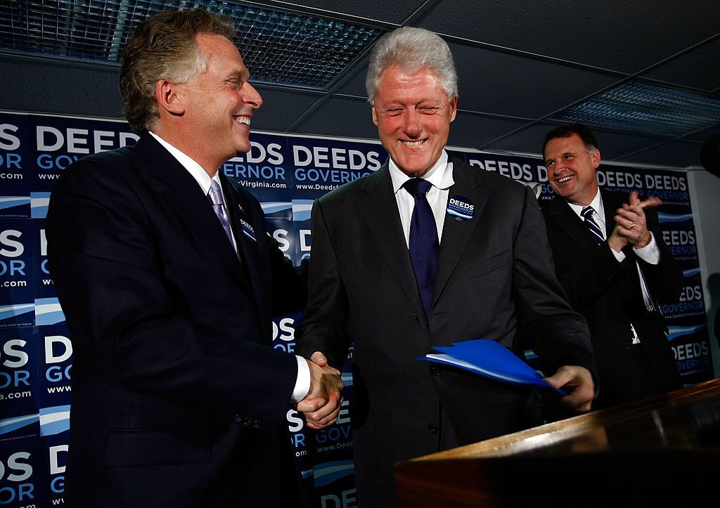 MCLEAN, VA - OCTOBER 20: Former U.S. President Bill Clinton and former Democratic National Committee Chairman Terry McAuliffe (L) campaign for Creigh Deeds (R), Virginia Democratic candidate for Governor, during an event at the Democratic Coordinated Campaign Headquarters October 20, 2009 in Mclean, Virginia. Deeds is running against Bob McDonnell, the Republican candidate for Governor in an election slated to be held November 3. (Photo by Win McNamee/Getty Images)