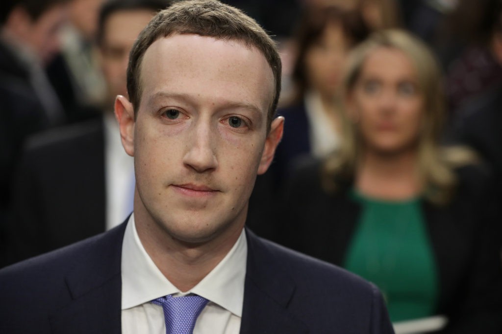 WASHINGTON, DC - APRIL 10: Facebook co-founder, Chairman and CEO Mark Zuckerberg testifies before a combined Senate Judiciary and Commerce committee hearing in the Hart Senate Office Building on Capitol Hill April 10, 2018 in Washington, DC. Zuckerberg, 33, was called to testify after it was reported that 87 million Facebook users had their personal information harvested by Cambridge Analytica, a British political consulting firm linked to the Trump campaign. (Photo by Chip Somodevilla/Getty Images)