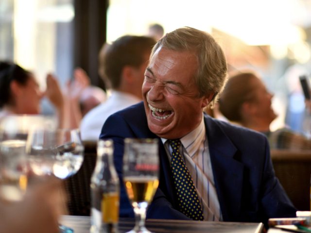 British politician Nigel Farage reacts at The Beer Factory Bar in Brussels on June 28, 2018, as he watches the Russia 2018 World Cup Group G football match between England and Belgium at the Kaliningrad Stadium in Kaliningrad. (Photo by Ben STANSALL / AFP) (Photo credit should read BEN STANSALL/AFP …