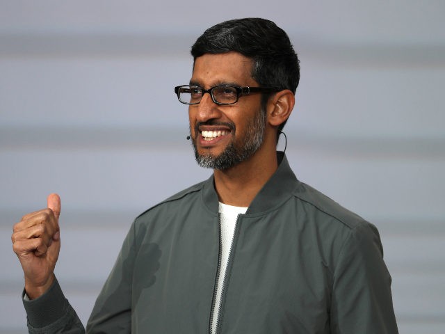 Google CEO Sundar Pichai smiles ( Justin Sullivan /Getty)