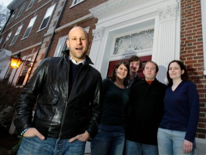 Greg Epstein, left, the humanist chaplain at Harvard University, poses with students after a group meeting on campus in Cambridge, Mass., Friday, March 6, 2009. Harvard students, from left, are sophomore Kelly Bodwin; sophomore Lewis Ward; sophomore Andrew Maher; and sophomore Greta Friar. Epstein envisions local humanist centers nationwide that …